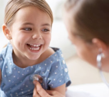 Smiling child at the doctor.