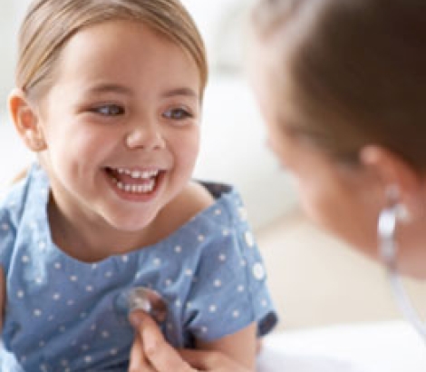 Smiling child at the doctor.