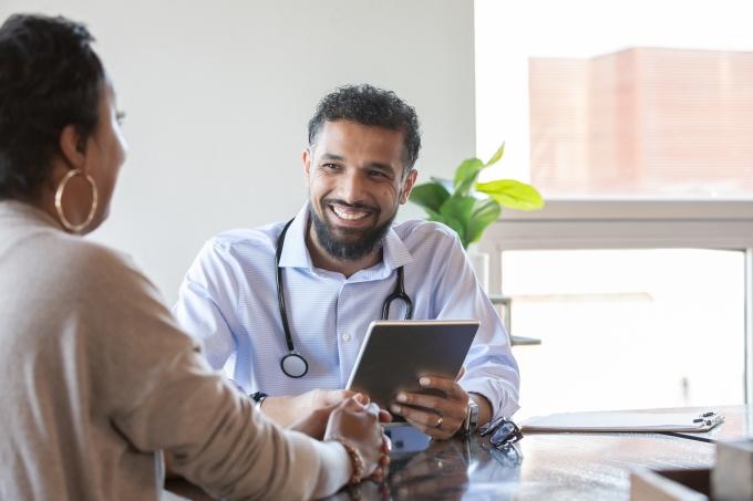 Doctor and Patient at appointment with ipad